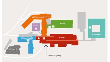 Übersichtskarte eines Gebäudekomplexes mit verschiedenen Bereichen: Baden, Pfalz, Württemberg, Schwarzwald, und Elsass, einschließlich Stationen und Aufzügen.